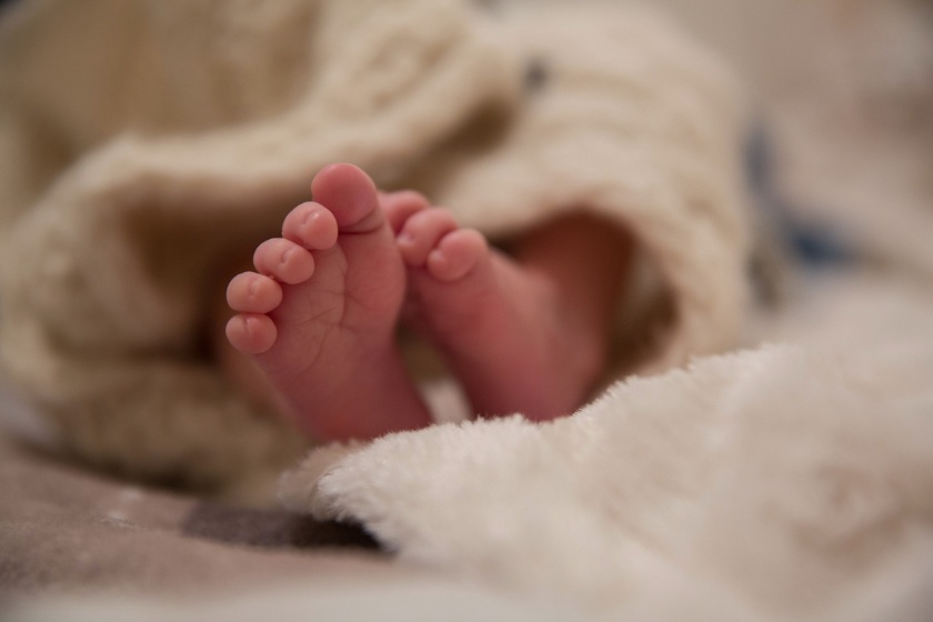 A pair of babies feet, representing the impact of birth injuries and trauma.